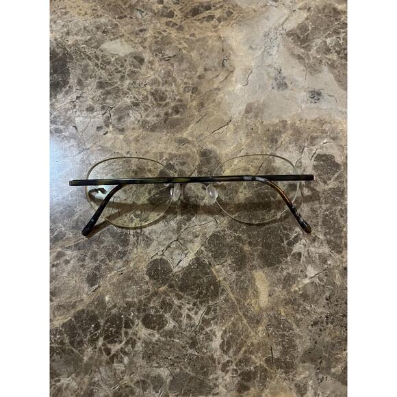 Marchon Airlock 2 - 770/39 RIMLESS EYEGLASSES 47-21-135 color 015 Tortoise - Picture 2 of 11